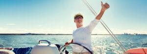6-MY-ACCOUNT-Man-sailing-thumbsup-300x111 sailing, age, tourism, travel and people concept - happy senior